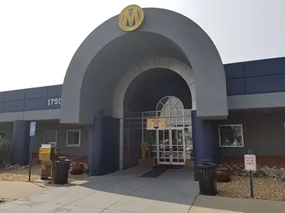 Front view of Manheim Auction Center in Denver, Colorado