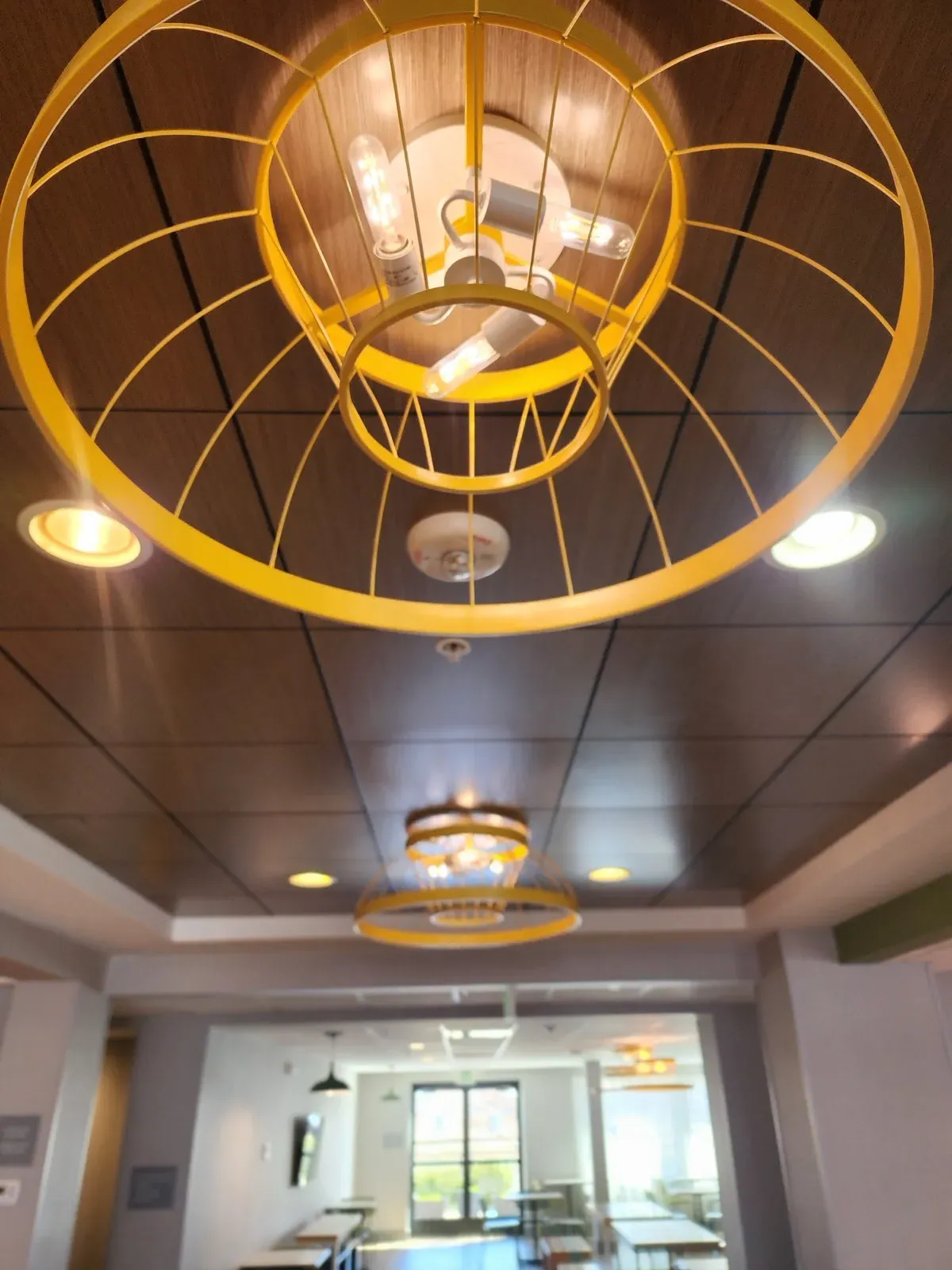 Decorative yellow pendant light fixtures in Spark by Hilton